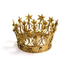 a gold crown with stars on it