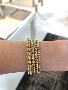 The perfect addition to your bracelet stack. Gold Ball Bracelet, Gem Water, Classic Bracelets, Ball Bracelet, Single Stone, Diamond Bangle, Classic Gold, Bracelet Stack, Heart Charm