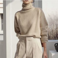 Cream Solid Winter Sweater, Chic Beige Soft Knit Sweater, Elegant Beige Solid Color Sweater, Beige Solid Color Winter Sweater, Oversized Fine Knit Beige Sweater, Beige Knit Sweater Solid Color, Classic Oversized Sweater, Cream Sweater For Fall, Cozy Solid Color Sweater For Work