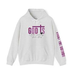 God is Still Writing Your Story Hoodie: Wrap Yourself in Divine Assurance Embrace the warmth of faith with our "God is Still Writing Your Story" Hoodie, a cozy reminder that your journey is a continually unfolding narrative guided by a higher power. Crafted with care and adorned with an uplifting message, this hoodie becomes more than just comfortable outerwear—it's a wearable testament to trust, resilience, and the unwritten chapters of your unique story. Made from premium materials, it brings Writing Your Story, Walk In Faith, Mother Baby Nurse, Christian Hoodies, Uplifting Messages, Nursing Clothes, Shopping App, Christian Clothing, Inspirational Message