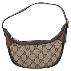 Gucci mini Ophidia half moon bag with gg classic canvas print, brown leather trim and gold tone hardware. Perfect exterior, minimum wear on interior. Adjustable shoulder strap drop 6”. Comes with original dustcover and box. Gucci Mini, Moon Bag, Printed Bags, Half Moon, Fashion Handbags, Leather Trims, Brown Leather, Gold Tones, Shoulder Strap