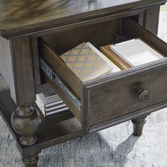 Elevate your living space with the timeless elegance of the Signature Design by Ashley Veramond End Table. This exquisite piece features a rich dark brown walnut finish that complements any decor style, from traditional to contemporary.

- Material: High-quality wood
- Color: Dark Brown
- Features: Profiled top, traditional baluster turned legs
- Additional: Lower shelf for displaying decorative items

Perfect for adding a touch of classic sophistication to your living room, this end table blend Brown End Table, Shoe Storage Furniture, Square End Table, Wood Grain Texture, Kids Vanity, Ornate Furniture, Display Storage, Low Shelves, Furniture Care