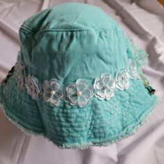 Lovely sun hat decorated with teal flowers, trim and pretty broaches.  Perfect for the beach or as a statement piece on the town. Free shipping from my store on orders over $35. Teal Flowers, Oak Park, Sun Hats For Women, Bucket Hats, Sun Hat, Sun Hats, Caps Hats, Accessories Hats, The Beach