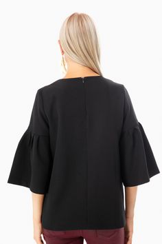 Modern and timeless, the Harper Bell Sleeve Blouse features a flowy silhouette, bell sleeves, and high neckline. Pair with your favorite skinny jeans and heels for a crisp architectural look!

Bell sleeves
Back zipper
Lined
95% polyester, 5% spandex
Care: Machine wash cold, tumble dry low Chic Formal Blouse With Ruffle Sleeves, Fall Bell Sleeve Blouse For Workwear, Chic Formal Tops With Ruffle Sleeves, Chic Top With Pleated Bell Sleeves, Chic Ruffle Hem Blouse For Night Out, Chic Tops With Pleated Bell Sleeves, Elegant Ruffle Hem Tops For Work, Elegant Ruffle Sleeve Blouse For Work, Bell Sleeve Tops For Fall Workwear