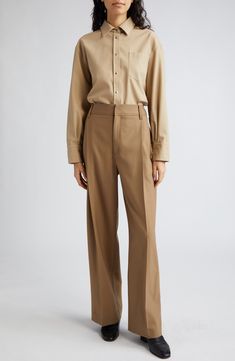 Topstitch detailing subtly calls out the classic lines of these pleated wide-leg trousers tailored from organic cotton in NYC. 30 1/2" inseam; 22" leg opening; 14 1/2" front rise; 16" back rise (size 8) Zip fly with hook-and-bar closure Front slant pockets; back welt pockets 100% organic cotton Hand wash, line dry Made in the USA of imported fabric Designer Clothing Classic Cotton Wide Leg Workwear Pants, Classic Cotton Wide Leg Pants For Work, Formal Cotton Wide Leg Pants With Relaxed Fit, Classic Full Length Wide Leg Pants With Relaxed Fit, Classic Cotton Wide Leg Pants With Welt Pockets, Formal Cotton Wide Leg Pants With Welt Pockets, Classic Brown Wide Leg Workwear Pants, Classic Brown Wide Leg Office Pants, Classic Brown Wide Leg Pants For Office