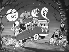 an old car with cartoon characters on it in the middle of a forest at night