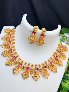 IndianDesigns offer the best collection of South Indian style Lakshmi temple necklace designs online at out Etsy store. You can choose any design as per your choice. One Gram Gold Necklace, Lakshmi Temple, Temple Jewelry, Necklace Design, Cz Jewelry, Latest Jewellery, Wedding Jewellery Necklace, American Diamond, Temple Jewellery