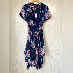 Tommy Hilfiger Women's Floral-Print Fit & Flare Dress Size 8 Nwt Elevate Your Wardrobe With The Tommy Hilfiger Women's Floral-Print Fit & Flare Dress In Size 8, Brand New With Tags! This Stunning Dress Features A Vibrant Floral Pattern That Effortlessly Combines Elegance And Fun, Making It Perfect For Any Occasion. The Fit & Flare Silhouette Flatters Every Figure, Offering A Comfortable Yet Chic Look. Crafted With High-Quality Materials, This Dress Ensures Durability And Style. Whether You're He Tommy Hilfiger Summer Beach Dress, Blue Tie Waist Wrap Dress For Spring, Spring Blue Wrap Dress With Tie Waist, Blue Wrap Dress With Tie Waist For Spring, Casual Blue Floral Print Wrap Dress, Spring Blue Knee-length Wrap Dress, Blue Knee-length Wrap Dress For Spring, Tommy Hilfiger Spring Midi Dress, Tommy Hilfiger Midi Dress For Spring