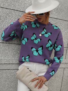 Our butterfly knit top comes in a dark purple base with turquoise butterfly embroidered. Your go-to chilling buddy while relaxing in the aroma of scented candles in a romantic ambience, this jumper is designed with a classic crew collar, long relaxed sleeves. Match it with our casual ankle boots or trendy cowgirl boots! Size Guide: Ambre is 5’2” tall, and has a 33.2” bust, 24.5”waist, & 36.7” hips. She is wearing a S / US 4 / AU 8. This top is true to size. Feature: Long relaxed sleeves. Crew ne Butterfly Sweater, Legging Sport, Sleeves Clothing, Long Sleeve Knit Sweaters, Self Design, Everyday Dresses, Printed Sweater, Butterfly Print, Sleeves Pattern