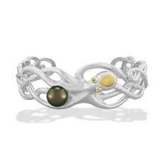 14K Yellow Gold and Sterling Silver Octopus Cuff Bracelet with a 10mm Tahitian Black Pearl. The inner circumference of the cuff bracelet measures approximately 7". Lifestyle Jewelry, Sea Life Jewelry, Rose Gold Brown, Starfish Bracelet, Golden South Sea Pearls, Tahitian Black Pearls, Cuff Bangle Bracelet, Hinged Bracelet, Brown Diamond