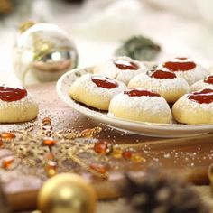 some cookies are on a plate with ketchup