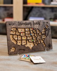 a wooden map is sitting on a table