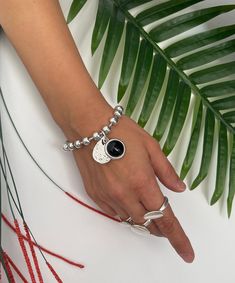 Womens silver bracelet, chunky chain bracelet, silver ball chain cuff, thick chain bracelet, Uno de 50 bracelet, womens gift, gift for women Welcome to my shop! 📌Please Kindly Note: The listing is for only one bracelet! 📌The black charm is made of glass cabochon. 📌It is made of brass and zamak, immersed in 999o sterling silver twice! 📌It is subjected to an anti-allergic process (nickel and lead-free). 📌Many of our jewelry has been through an oxidation process. Therefore, some natural black Trendy Silver Metal Beaded Bracelets, Trendy Silver Jewelry With Ball Chain, Trendy Silver Ball Chain Jewelry, Trendy Handmade Silver Chain Bracelet, Handmade Trendy Silver Beaded Bracelets, Trendy Handmade Silver Beaded Bracelet, Trendy Handmade Silver Charm Bracelet, Chunky Silver Bracelet Jewelry, Silver Beaded Bracelet With Ball Chain As Gift