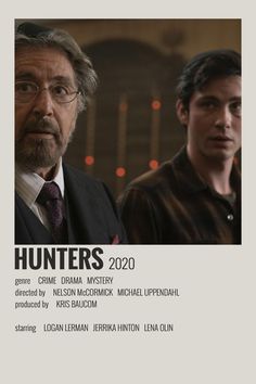 two men standing next to each other in front of a white poster with the words hunters on it