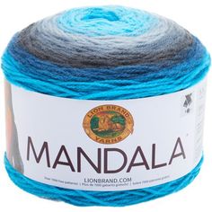 a ball of yarn with the words mandala written in black and blue on it