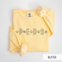 a yellow shirt with the words peds on it