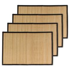 four bamboo placemats with black border