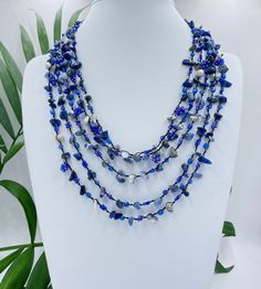 Big bold chunky multi strand handmade necklace. Lapis lazuli  beaded statement jewelry gift for women. You can wear this unique navy blue gemstone jewelry day or evening. Fits perfectly into shirts or summer dresses This necklace can make even an everyday dress stunning. It will be the perfect gift for yourself and a wonderful woman around you. While designing my necklaces, I pay attention to multi-purpose use. It can be used for casual evening or wedding, it's up to you and your choices .  For Handmade Blue Multi-strand Necklace, Blue Multi-strand Natural Stone Necklaces, Blue Multi-strand Necklace With Natural Stones, Blue Multi-strand Natural Stone Necklace, Artisan Multi-strand Blue Necklaces, Bohemian Blue Lapis Lazuli Beaded Necklace, Handmade Blue Long Crystal Necklace, Handmade Artisan Blue Crystal Necklaces, Artisan Handmade Blue Crystal Necklaces