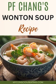 a bowl of wonton soup with shrimp and cilantro in it on a wooden table