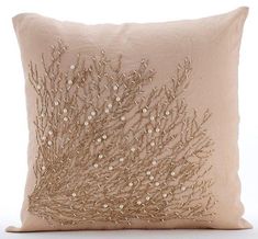 a decorative pillow with sequins on it