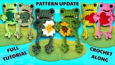 four crocheted frogs sitting on top of a leaf with flowers in their hands