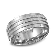 Wow him with a look that pairs texture and dimension in one fabulous look. Fashioned in sleek stainless steel, this ring features a diamond-cut and textured center band with grooved detailing. Polished bands border this center stripe, giving this 6.0mm wide band sophisticated appeal. Polished to a brilliant shine, this ring makes a stylish wedding band for him. Custom made to fit his ring size. Stainless steel rings cannot be resized after purchase. Wedding Band For Him, His Ring, Wedding Bands For Him, Stylish Wedding, Size 10 Rings, Stainless Steel Rings, Wide Bands, Steel Ring, Steel Metal