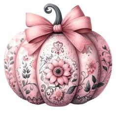 a pink painted pumpkin with a bow on it's top and floral decorations around the bottom