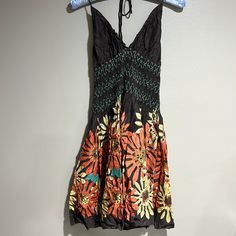 Bohemian Halter Dress Open Back Great For Spring /Summer. Gorgeous Cute Dress. Brand Hot Kiss Sz- Small Stretchy Fabric. 100% Cotton. Soft On The Skin. Multi Color Brown/Cream/Orange. Nwt/Never Worn/Excellent Condition. No Flaws Pit To Pit 12 Inch Approx. Can Be Stretch Length Approx 34 Inch If Have Questions Send Me A Comment. Happy Shopping! Fitted Multicolor Casual Beach Dress, Casual Fitted Multicolor Beach Dress, Orange Sundress Mini Dress For Beach, Hippie Floral Print Mini Dress For Beach, Orange Mini Beachwear Dress, Brown V-neck Summer Sundress, Orange Sleeveless Sundress For Beachwear, Orange Sleeveless Beachwear Sundress, Fitted Summer Sundress With Boho Print