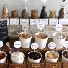 an assortment of desserts are displayed in bowls