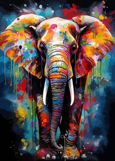 an elephant with paint splatters on it's face and tusks