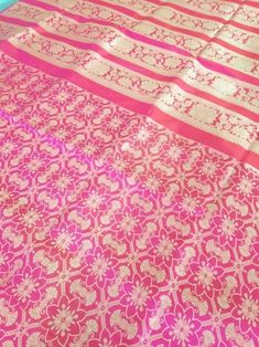 This Banarasi handloom pure silk lehenga is a perfect festive/wedding/occasional wear it enhanced with pink color motifs.  Occasion: party wear/wedding  Materials. Pure silk. Unstich lehenga  Fabric design - Banarasi  lehenga  Pattern: paisley/buti motifs.  Borders: yes  Border type: Zari  Zari type: golden zari  Fabric length with blouse and with dupatta.  Borders is 6.5 meters  Blouse: 0.85 Meters  No of kali: 18 Size of kali 42 inch  No of border in dupatta 9 Pink Raw Silk Dupatta, Festive Pink Raw Silk Traditional Wear, Pink Raw Silk Saree For Wedding, Pink Dola Silk Traditional Wear With Zari Work, Traditional Pink Raw Silk Anarkali Set, Pink Katan Silk Anarkali Set With Traditional Drape, Pink Dola Silk Traditional Wear With Dupatta, Pink Silk Sharara With Zari Work, Traditional Pink Katan Silk Anarkali Set