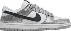 Metallic Low-top Sneakers For Sports, Metallic High-top Sneakers For Streetwear, Sporty Metallic Sneakers, Sports Lace-up Sneakers With Metallic Logo, Nike Metallic Sneakers For Streetwear, Metallic Sneakers For Sports, White Sports Sneakers With Metallic Logo, Metallic Round Toe Sneakers For Sports, Metallic Lace-up Sports Sneakers