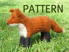 a knitted fox is in the grass with words over it that read, knitting pattern