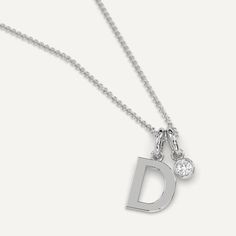 A personalized initial necklace design featuring a letter D pendant. This beautiful women's letter necklace is approx. 1cm tall and comes in solid 14k white or yellow gold with an optional 0.05 carat (3mm) diamond and an adjustable 16 inch - 18 inch chain. Letter D Necklace, Necklace Gold Diamond, D Necklace, D Initial, Beautiful Name, Single Letter, Pendant For Women, Necklace Design, Letter D