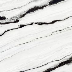 an aerial view of white and black marble