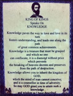 a plaque with the words king of kings on it and an image of a man's face