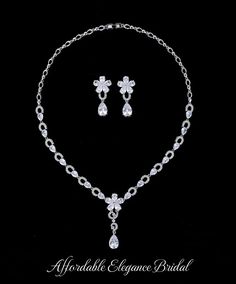 a necklace and earring set is shown on a black background with the words, adorable elegance bridal