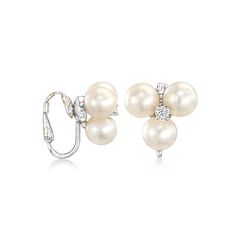 Ross-Simons - C. 1960 Vintage 7mm Cultured Pearl, .20ct t. w. Diamond Earrings. C. 1960. Just joined our Estate collection, this classic pair will fit in seamlessly with any wardrobe. The elegant designs present 7mm cultured pearl trios, whose sheeny surfaces are illuminated by .20 ct. t. w. round brilliant-cut diamond centerpieces. Crafted in 14kt white gold. Leverback, diamond and white pearl earrings. Exclusive, one-of-a-kind Estate Jewelry. Pearl birthstones are the perfect gift for June birthdays. Diamond Centerpiece, White Pearl Earrings, Pearl Birthstone, White Pearl Earring, Jewelry Pearl, Elegant Designs, Round Brilliant Cut Diamond, White Pearl, Cultured Pearls