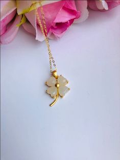 A piece of charming & cute white jade necklace, which is made with genuine 100% natural real white jades and 14k gold plated necklace. A great combination of modernness and elegance. The simple and lovely lucky clover design adds a spark to your daily wear or a bit of charm for your fun dating night. Perfect as a gift for your loved ones or yourself, and to wish them GOOD LUCK! Some Highlights of this piece 18'' white lucky Chinese jade pendants are: ＊High-quality Material Only 100% natural Delicate White Necklace For Gift, Elegant White Jade Jewelry, Elegant White Jewelry For Good Luck, White Pendant Necklace For Good Luck, White Flower Pendant Jewelry Gift For Her, White Delicate Gemstone Necklace, Delicate White Gemstone Necklace, White Jade Jewelry For Wedding, White Flower Pendant Necklace For Anniversary