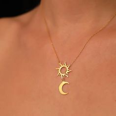 Looking for a unique and meaningful piece of jewelry? Our Sun and Moon Harmony Necklace embodies both balance and beauty, making it a perfect addition to any jewelry collection. Crafted with high-quality materials and expert attention to detail, this necklace features a beautiful sun and moon design that symbolizes harmony and balance. The pendant is crafted with intricate details and hangs from a delicate chain, making it a perfect piece for layering or wearing on its own. This Sun and Moon Har Celestial Sun And Moon Sterling Silver Necklace, Sun And Moon Design Necklace As Gift, Celestial Sun And Moon Necklace, Gift Moon And Sun Design Necklaces, Sun And Moon Design Necklace For Gift, Elegant Adjustable Sun And Moon Necklace, Celestial Jewelry With Sun And Moon Designs, Celestial Sun And Moon Jewelry, Celestial Sun And Moon Design Jewelry