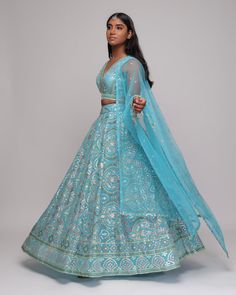 Manisha Lengha Festive Light Blue Sharara For Reception, Traditional Light Blue Sharara For Reception, Light Blue Sharara With Dupatta For Reception, Light Blue Sets For Reception And Diwali, Light Blue Wedding Sets For Navratri, Designer Semi-stitched Light Blue Lehenga, Traditional Drape Light Blue Lehenga For Diwali, Fitted Light Blue Anarkali Set With Zari Work, Light Blue Sharara With Zari Work For Reception