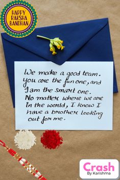 an envelope with a note attached to it next to some flowers and confetti