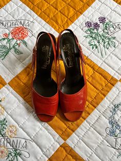 "60s - PAPPAGALLO - ORANGE LEATHER SANDALS: - Pappagallo brand - Orange leather - Brown leather footbeds - Buckle closure - Leather soles - Stacked wooden heels - Made in Spain - Quintessential 60s! MEASUREMENTS: Heel to toe (inside): 9 1/4\" Width (widest part): 3\" Heel height: 3 1/2\" Marked a size 7 1/2 M WOULD BEST FIT A SIZE 7 1/2 - 8 PLEASE COMPARE THE GIVEN MEASUREMENTS AGAINST A PAIR OF YOUR OWN SHOES TO ENSURE A GOOD FIT CONDITION: Overall, excellent conditionwear to soles + footbeds.  PLEASE REACH OUT WITH ANY QUESTIONS YOU MAY HAVE. I'M HAPPY TO HELP! ALSO, FEEL FREE TO CHECK OUT MY SHOP'S POLICIES. ITEMS WILL BE CAREFULLY + LOVINGLY PACKAGED + SHIPPED.  I DO NOT ACCEPT RETURNS OR EXCHANGES. ALL SALES ARE FINAL, THANK YOU." Embroidered Wall Art, Wooden Heels, Leather Platform Sandals, Striped Mini Dress, Wooden Heel, Orange Leather, I'm Happy, Platform Sandals, White Leather