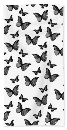 black and white butterflies flying in the air on a white background hand towel by panoramic images