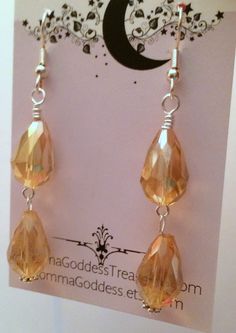 Women, Earrings, Holiday Gold Crystal Dangle Earrings by MommaGoddess on Etsy Faceted Teardrop Crystal Earrings For Parties, Gold Crystal Teardrop Earrings For Party, Gold Faceted Dangle Chandelier Earrings, Gold Long Drop Teardrop Earrings For Party, Gold Faceted Chandelier Dangle Earrings, Party Teardrop Long Drop Earrings, Gold Dangle Drop Earrings For Party, Gold Crystal Earrings With Faceted Beads, Faceted Crystal Teardrop Earrings