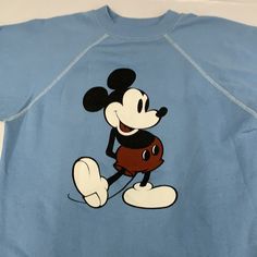 Vintage Mickey Mouse crewneck sweater 1970s Size: Adult Large top to bottom-23” chest-20” Sleeve-27” Condition: small paint stain on sleeve Cheap Mickey Mouse Crew Neck Top, Disney Sweaters Vintage, Old Mickey Mouse Vintage Shirt, Mickey Vintage Sweater, Blue Crewneck, Baby Mouse, Vintage Mickey Mouse, Vintage Mickey, Paint Stain