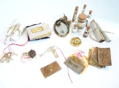 an assortment of items are displayed on a white surface with some writing and other things