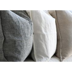 several pillows stacked on top of each other