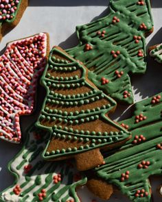 decorated christmas cookies with sprinkles and trees