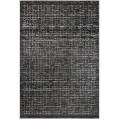 an area rug with black and grey squares